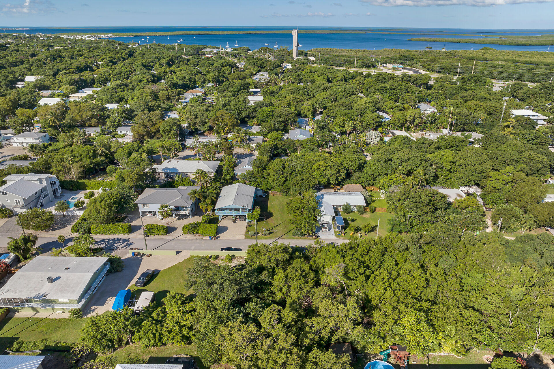 993 Gibraltar Road Key Largo, FL 33037 - Photo 3 of 14 an aerial view of residential houses with outdoor space and trees