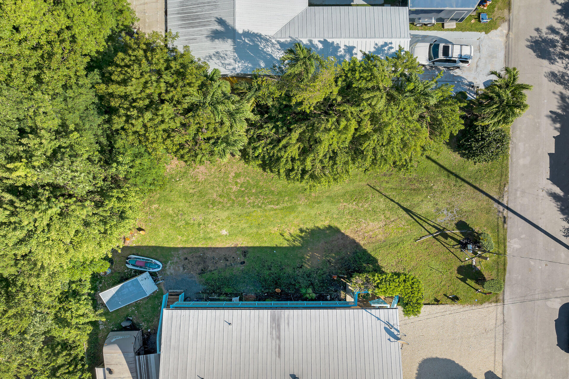 993 Gibraltar Road Key Largo, FL 33037 - Photo 6 of 14 an aerial view of a house with a yard