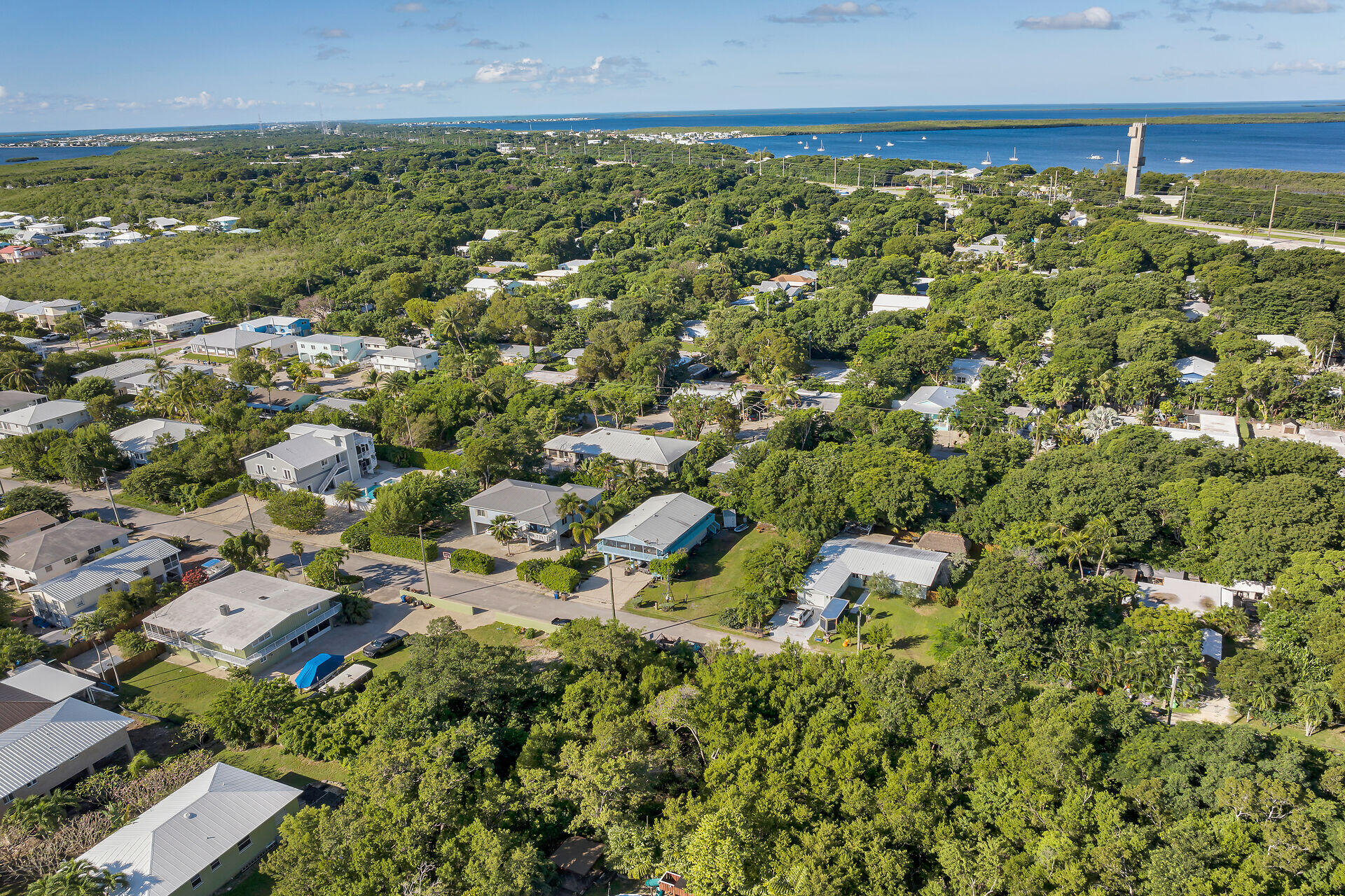 993 Gibraltar Road Key Largo, FL 33037 - Photo 5 of 16 an aerial view of residential houses with outdoor space and trees