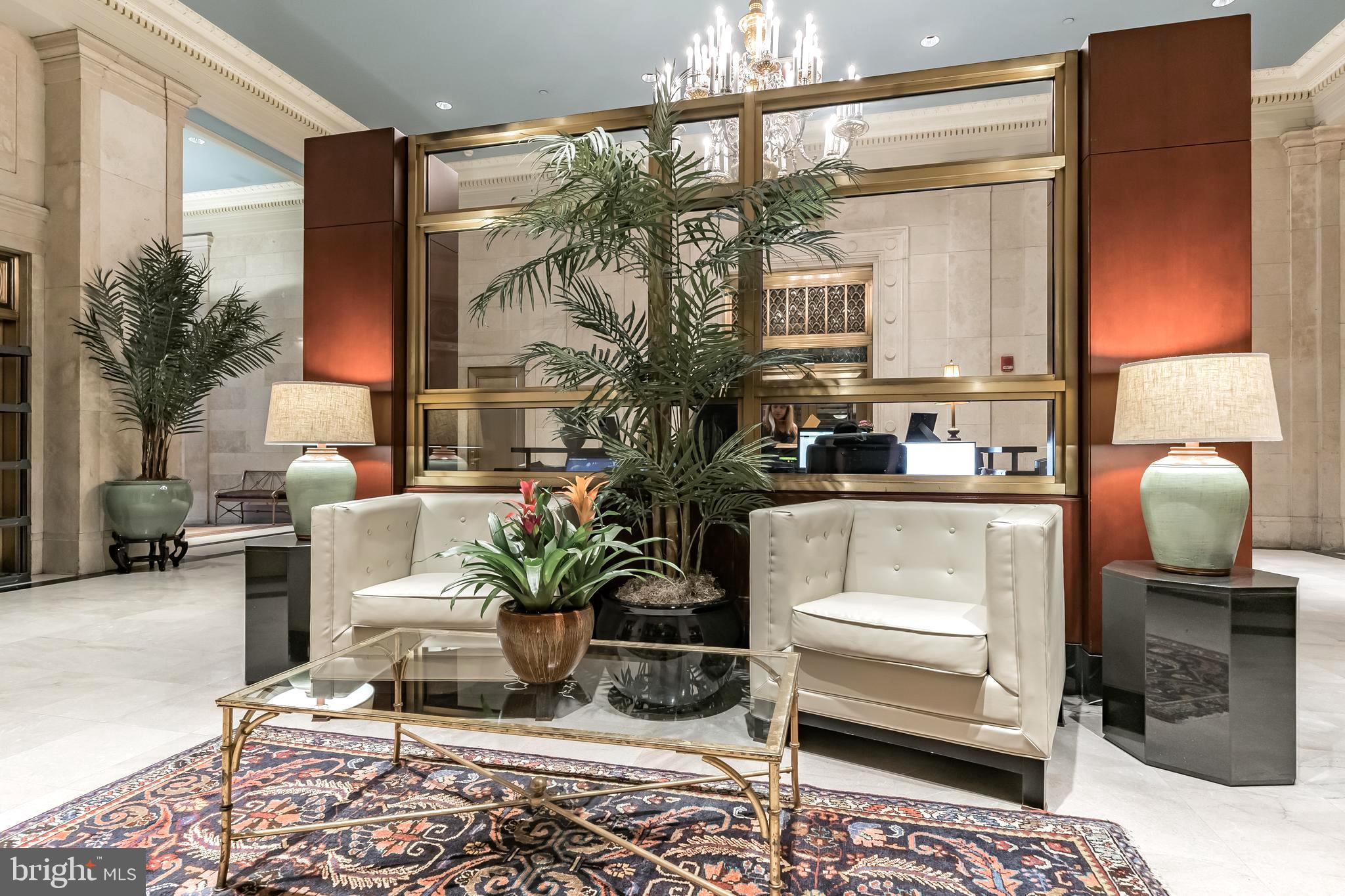 1600 Arch Street, Unit 612 Philadelphia, PA 19103 - Photo 4 of 11 a living room with furniture and a potted plant