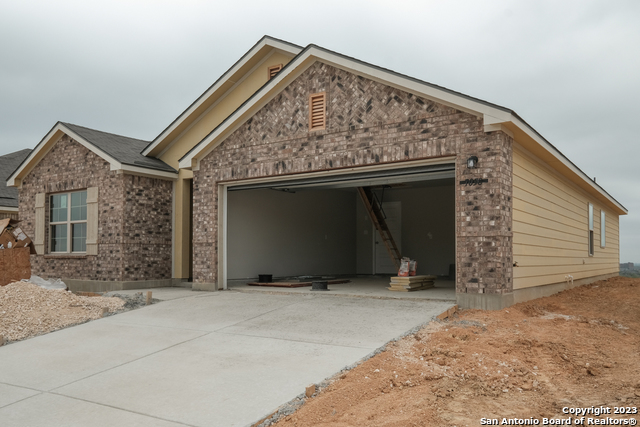 7058 Vista Loop Live Oak, TX 78233 - Photo 1 of 1 a view of a house with a garage