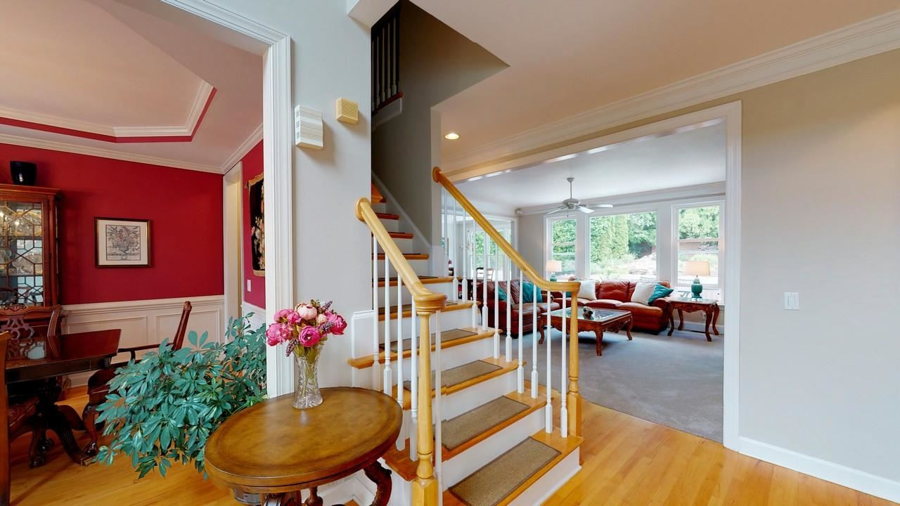 12432 Canolder Street Raleigh, NC 27614 - Photo 4 of 30 Foyer looking into the main floor family room. Entry