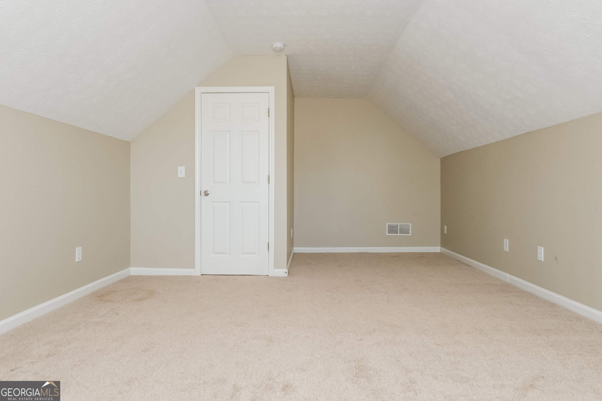 1343 Wimbleton Cove Hampton, GA 30228 - Photo 13 of 17 a view of an empty room