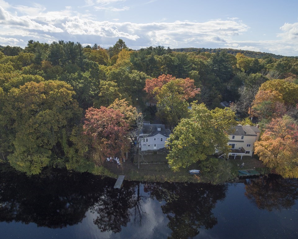 36 Shore Road Wellesley, MA 01760 - Photo 1 of 27 a view of a lake with a mountain