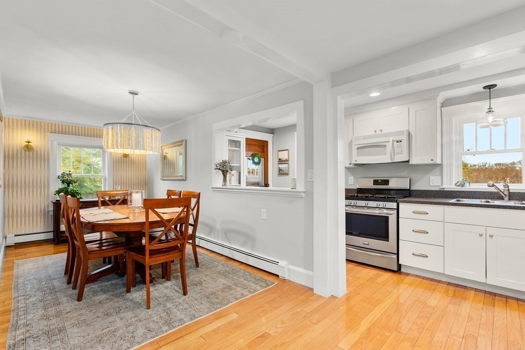 36 Shore Road Wellesley, MA 01760 - Photo 11 of 27 a view of a dining room with furniture and wooden floor