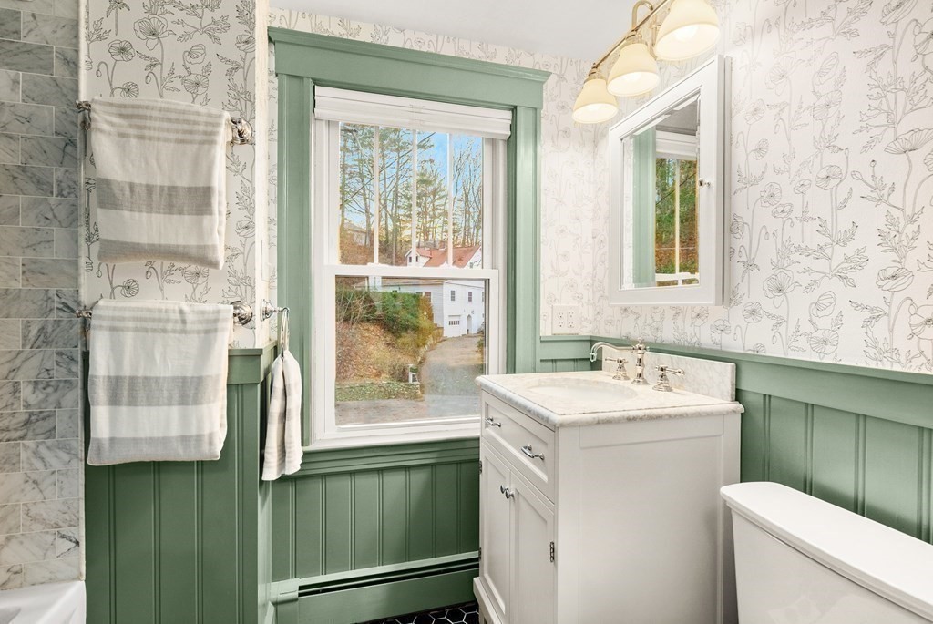 36 Shore Road Wellesley, MA 01760 - Photo 14 of 27 a bathroom with a sink and a toilet