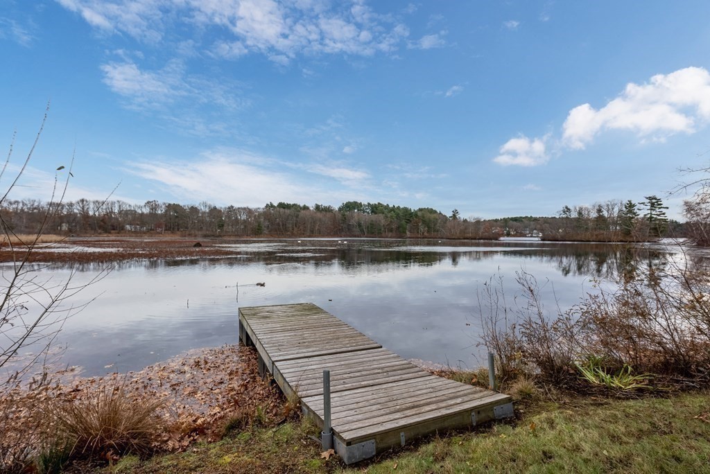 36 Shore Road Wellesley, MA 01760 - Photo 19 of 27 a view of a lake with houses in the back