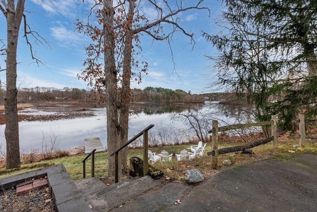 36 Shore Road Wellesley, MA 01760 - Photo 21 of 27 a view of a lake with a tree