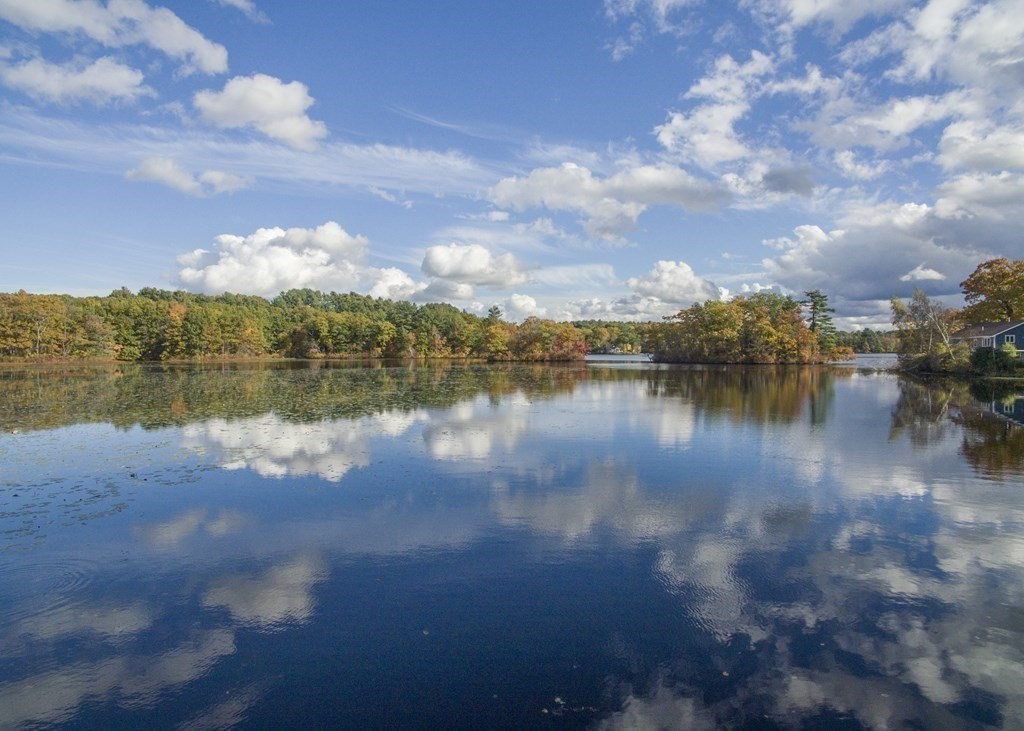 36 Shore Road Wellesley, MA 01760 - Photo 25 of 27 a view of a lake with houses in the background