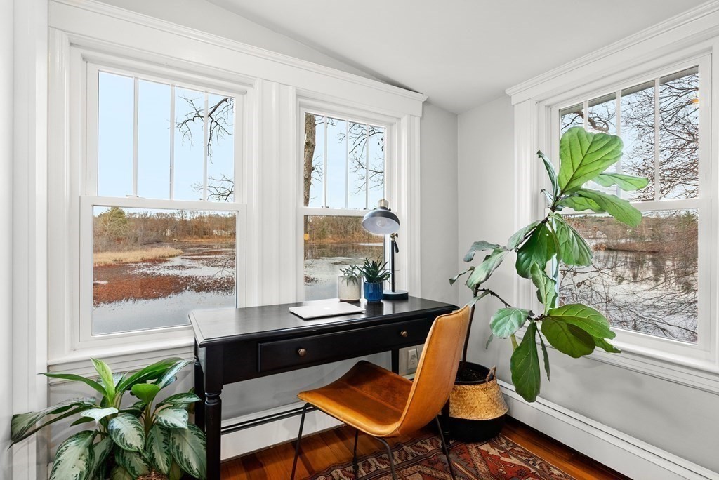 36 Shore Road Wellesley, MA 01760 - Photo 7 of 27 a living room filled with furniture and a potted plant
