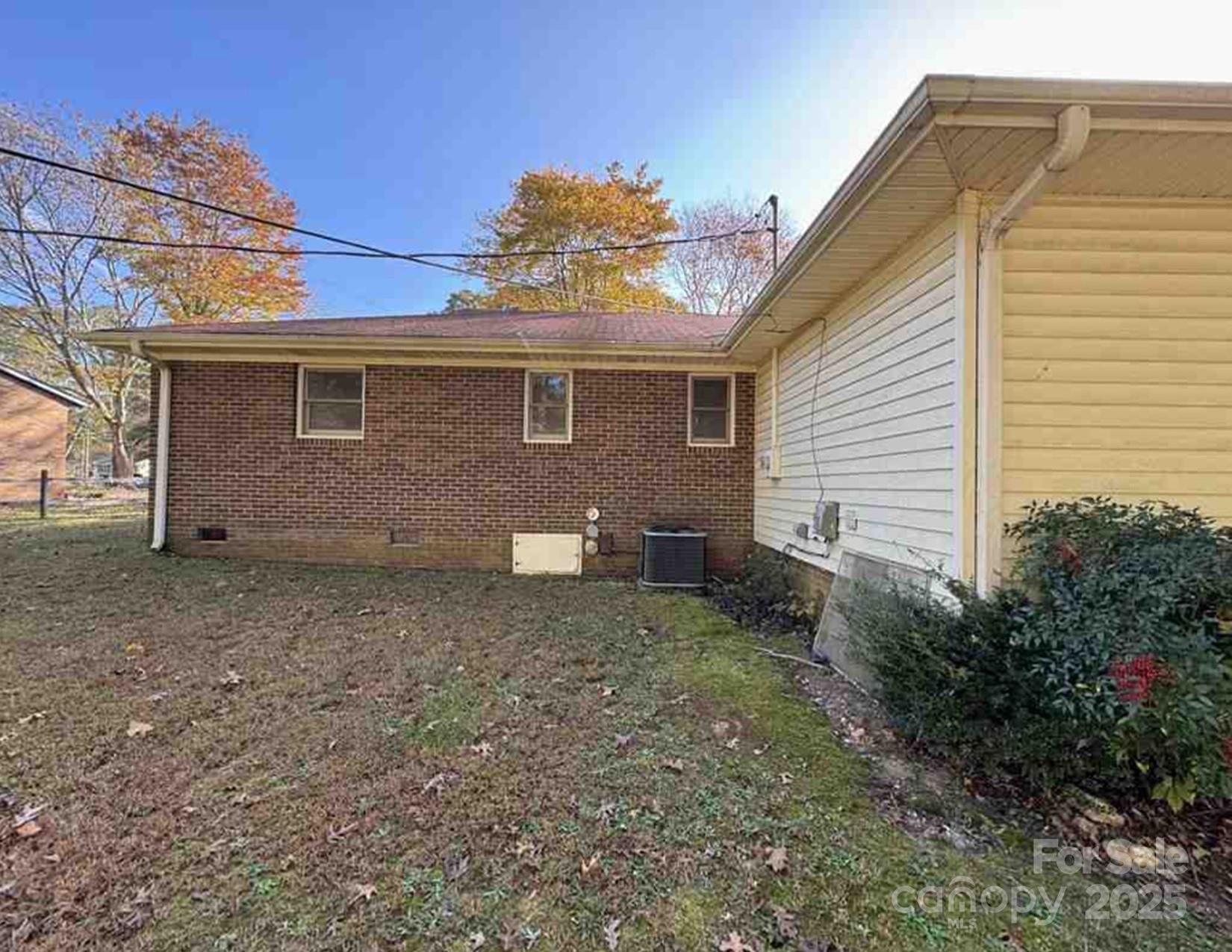 104 Spargo Street Gastonia, NC 28056 - Photo 3 of 4 a view of a house with a backyard