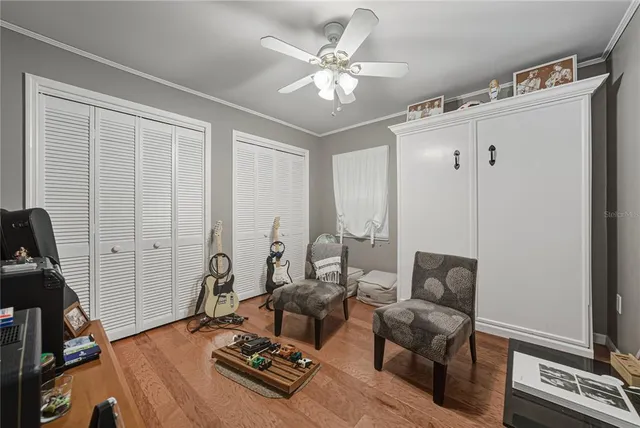 a bathroom with a sink vanity mirror and toilet