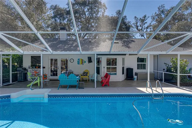 a view of outdoor space with wooden floor and seating space