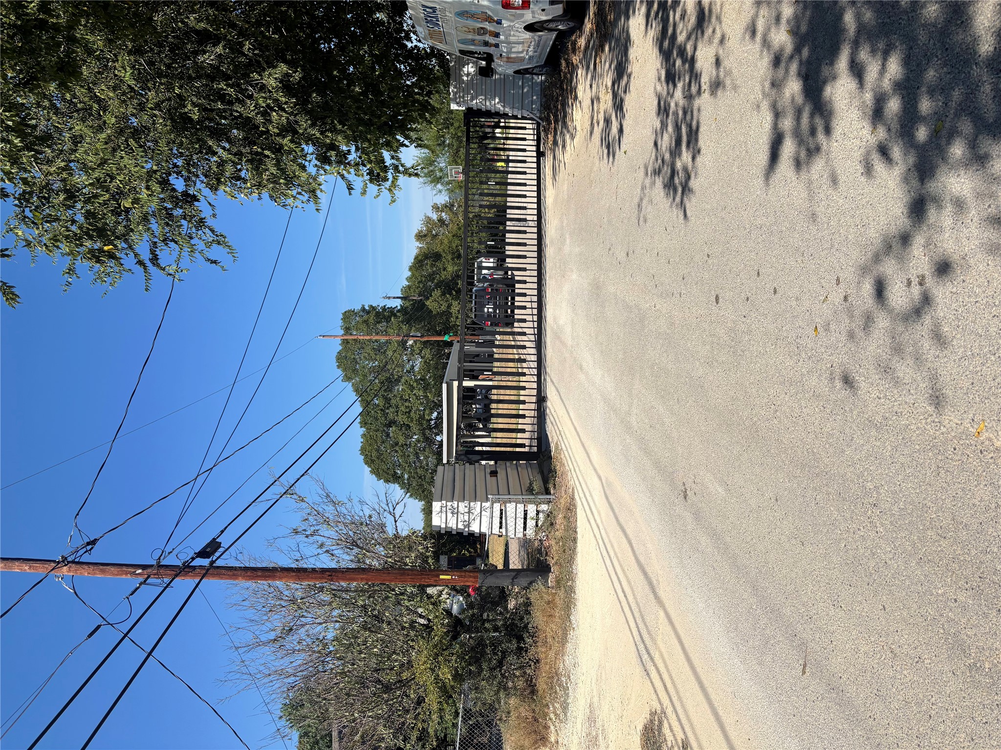 1803 Lipan Trail Austin, TX 78733 - Photo 2 of 20 a view of street with a building in the background