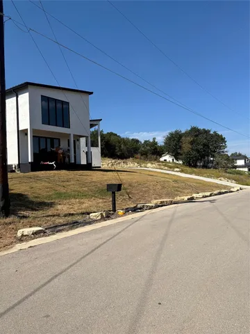 a view of a house with a ocean view