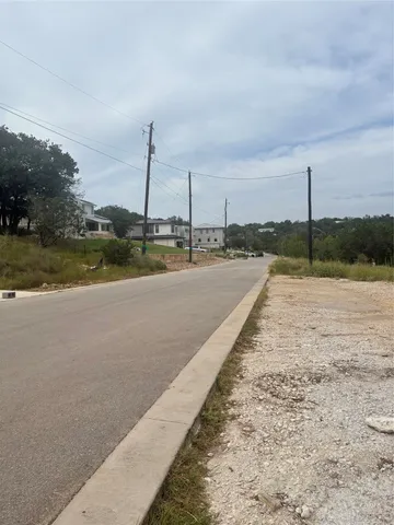 a view of a lake with a large trees