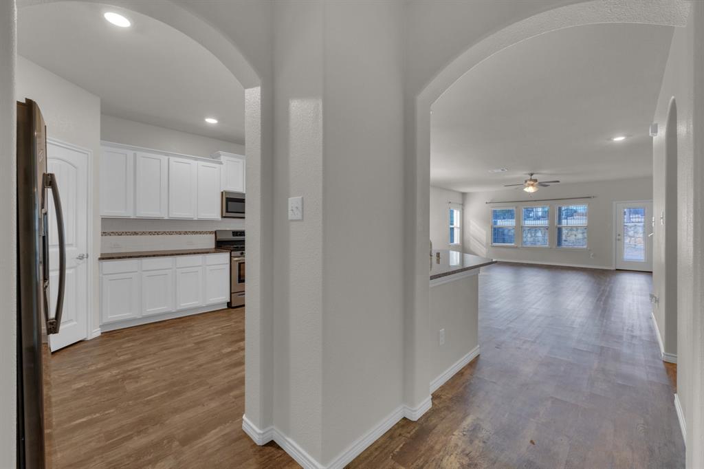 610 Bassett Hall Road Fate, TX 75189 - Photo 6 of 28 Hall with hardwood / wood-style floors