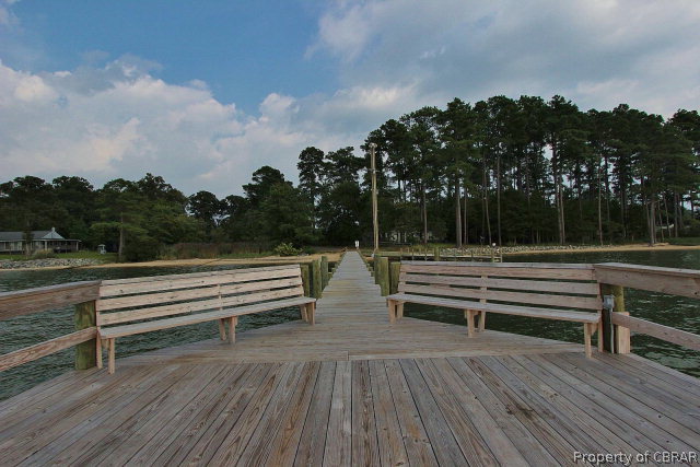 80 Deer Run Road Lancaster, VA 22503 - Photo 30 of 32 a view of outdoor space with deck and hardwood