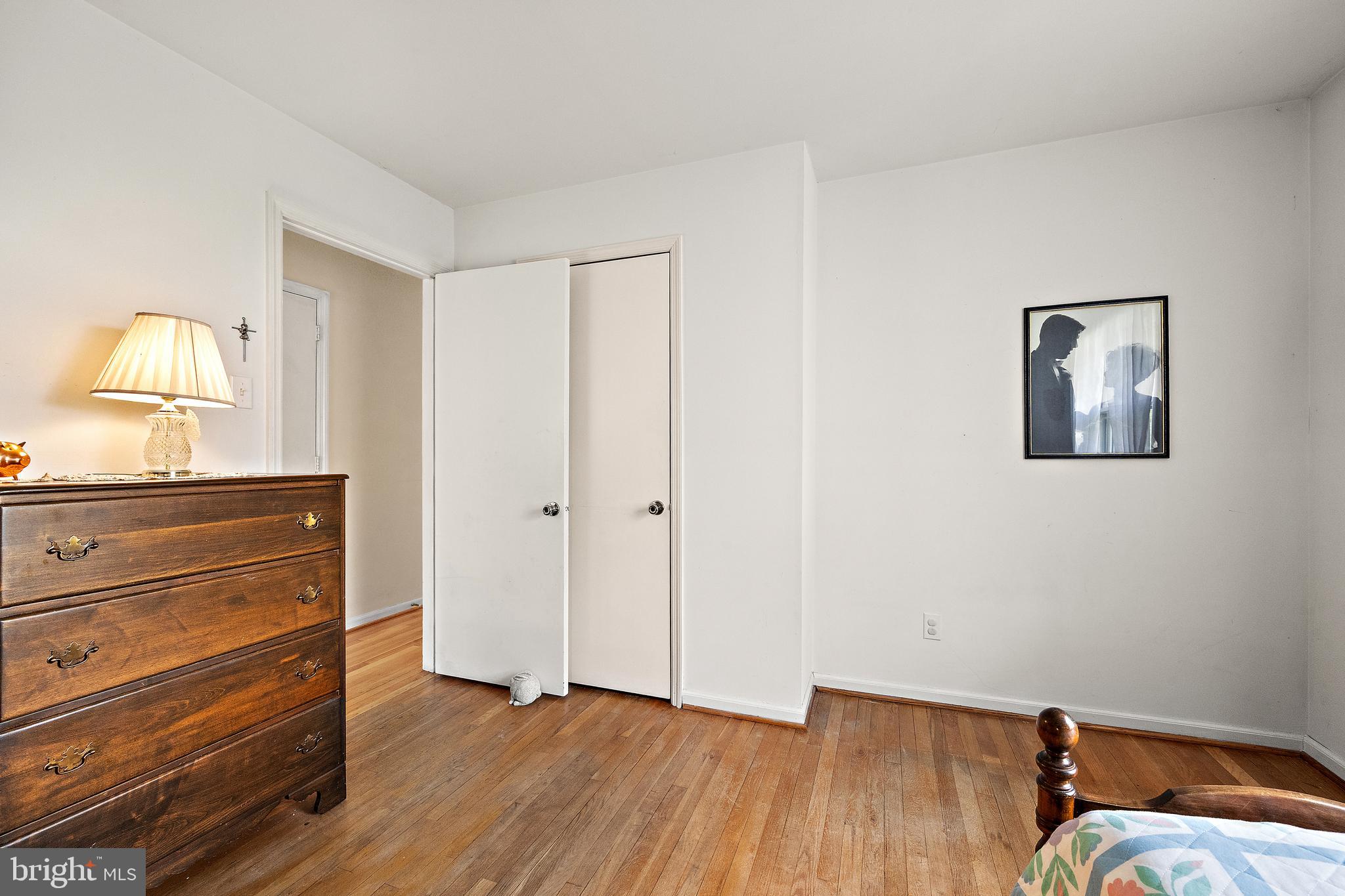 509 Holly Knoll Road Hockessin, DE 19707 - Photo 18 of 34 a view of bedroom with furniture and wooden floor
