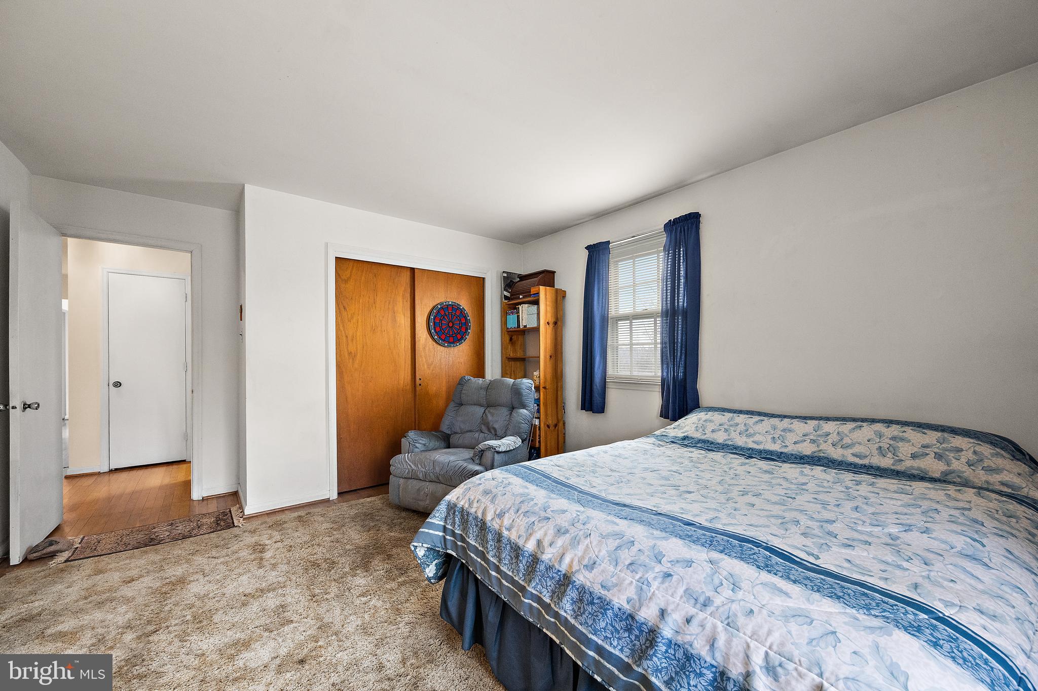 509 Holly Knoll Road Hockessin, DE 19707 - Photo 20 of 34 a bedroom with a bed and a dresser