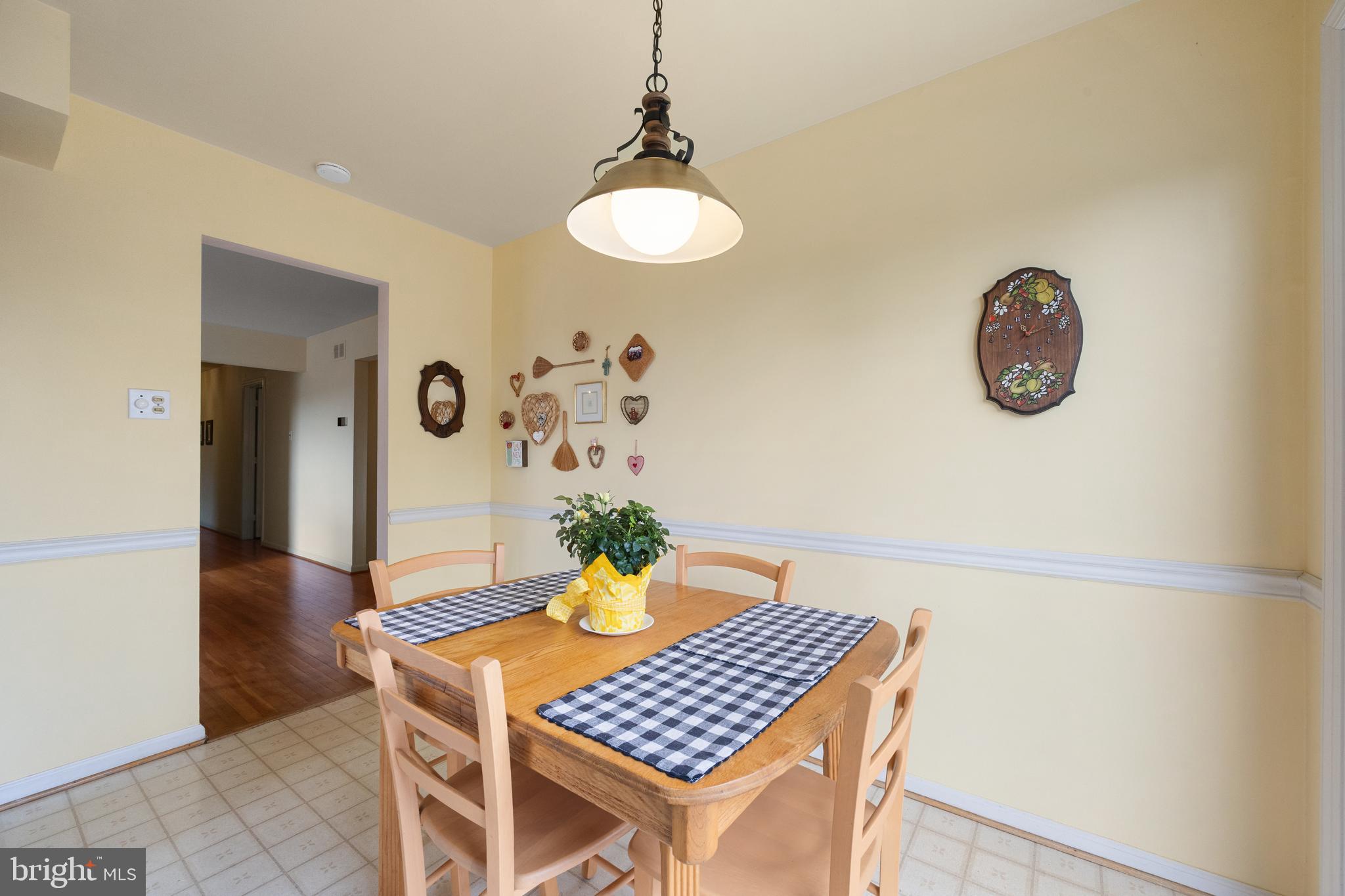 509 Holly Knoll Road Hockessin, DE 19707 - Photo 9 of 34 a view of a dining room with furniture