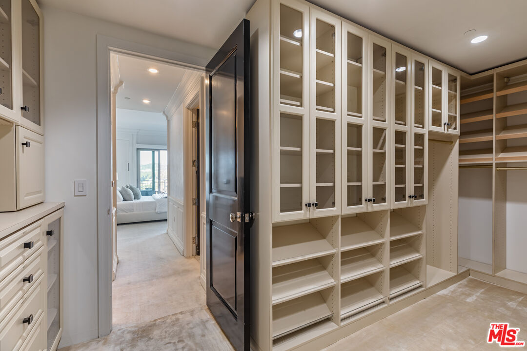 10727 Wilshire Boulevard, Unit 1702 Los Angeles, CA 90024 - Photo 15 of 43 a view of a walk in closet
