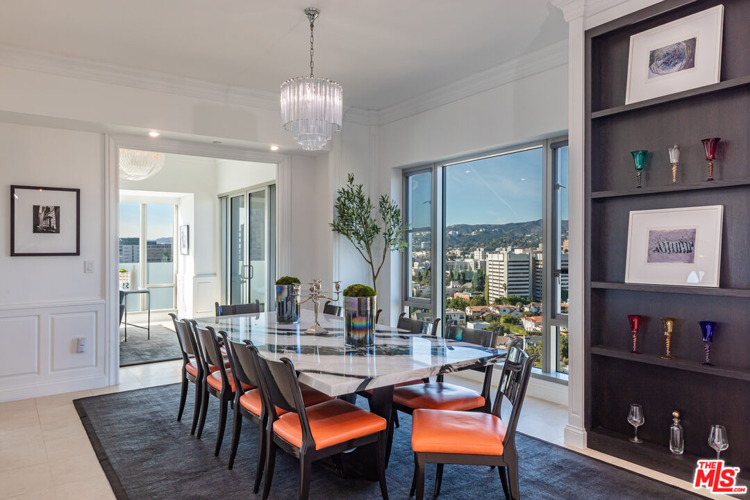 10727 Wilshire Boulevard, Unit 1702 Los Angeles, CA 90024 - Photo 6 of 43 a view of a dining room with furniture