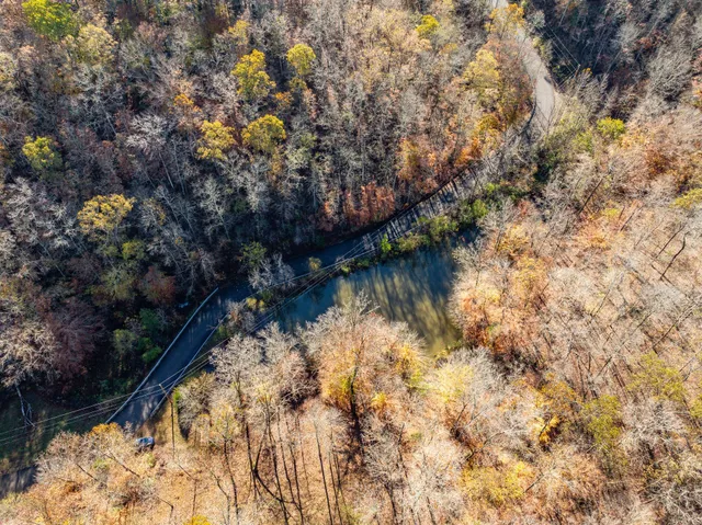 a view of lake with green space