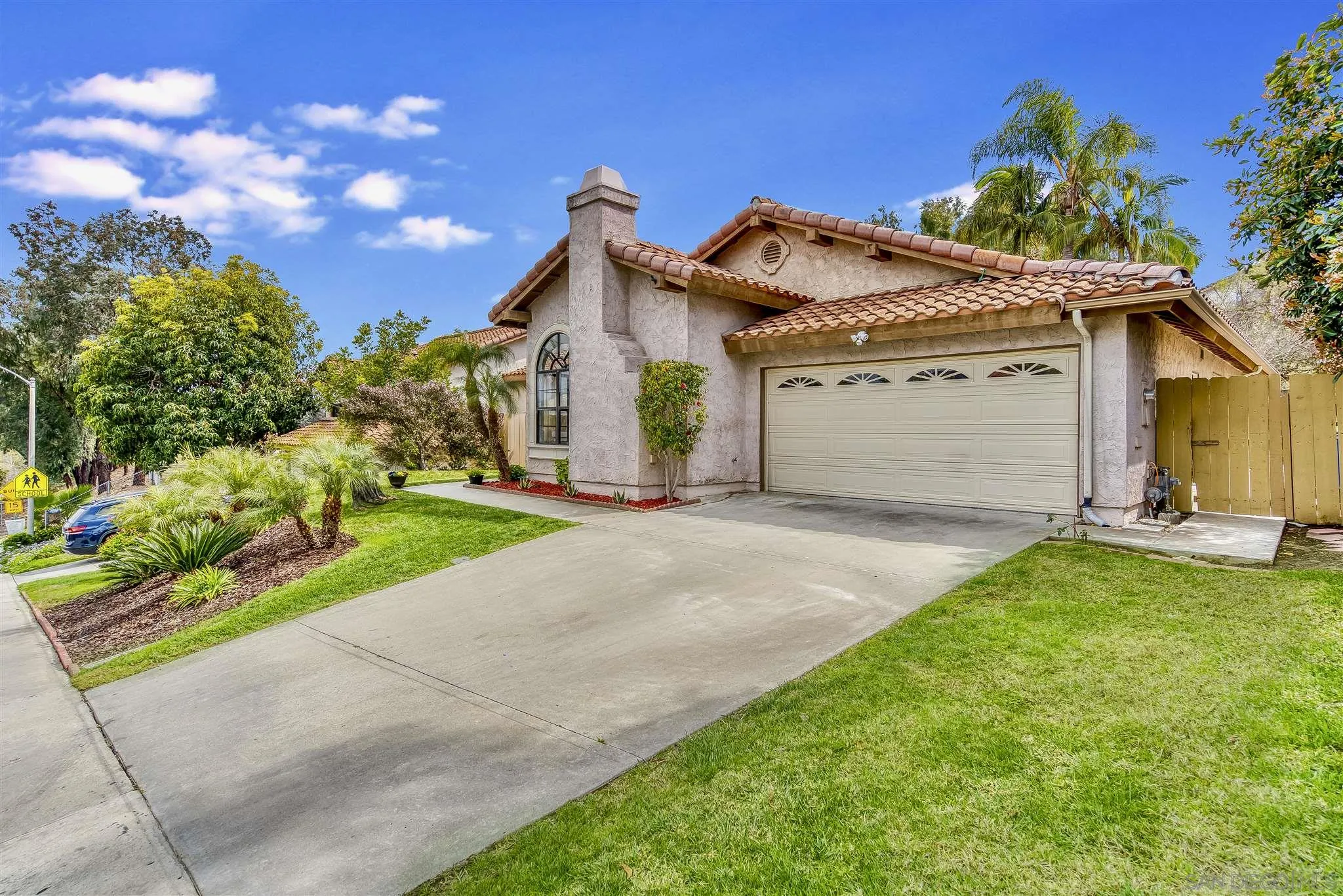 1975 Avenida La Posta Encinitas, CA 92024 - Photo 1 of 29 a view of a house with a yard and potted plants