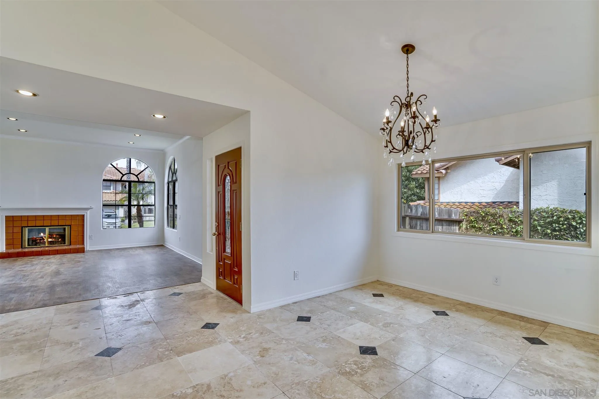 1975 Avenida La Posta Encinitas, CA 92024 - Photo 11 of 29 a view of a hallway with chandelier and livingroom view