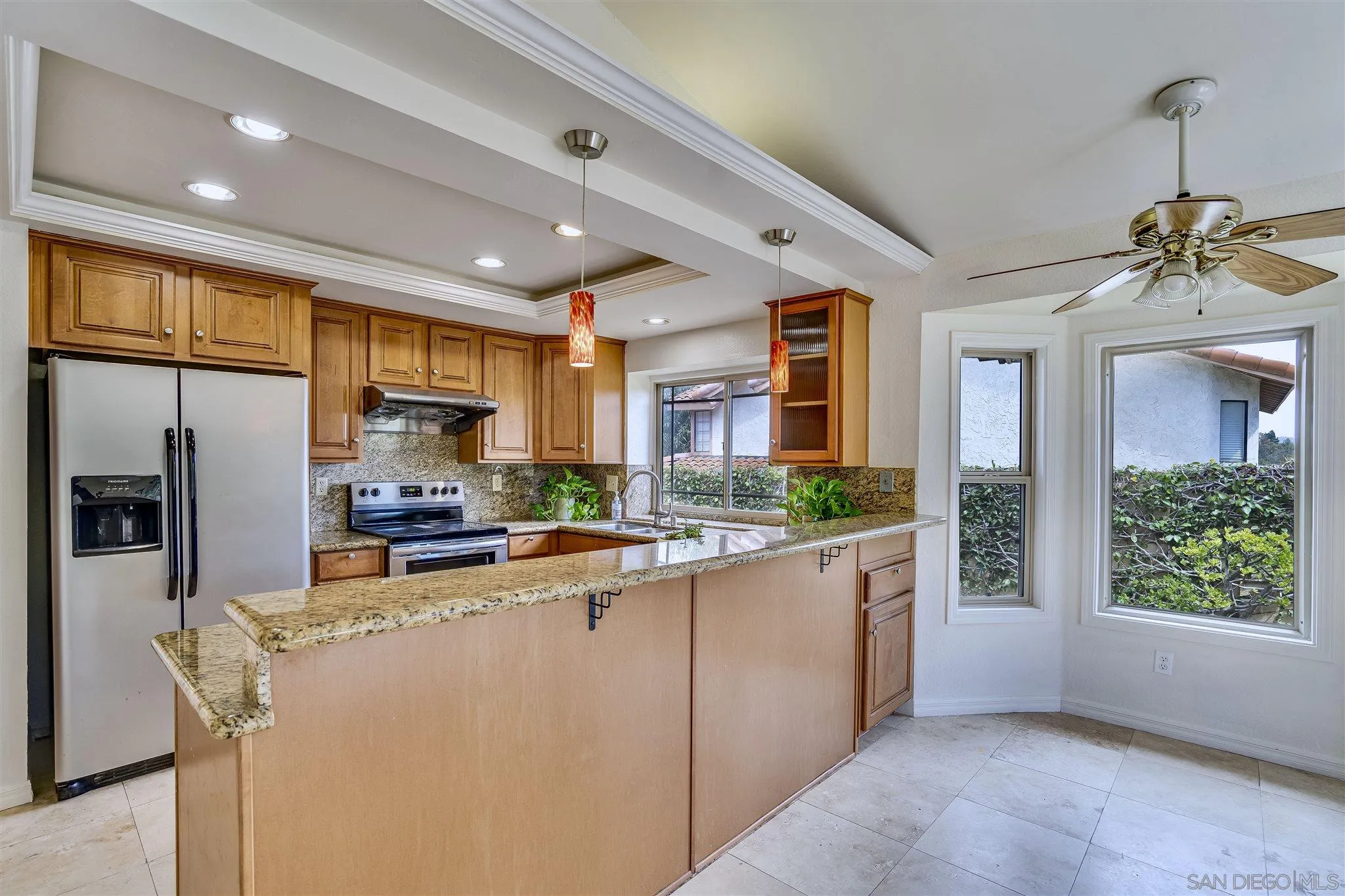 1975 Avenida La Posta Encinitas, CA 92024 - Photo 16 of 29 a kitchen with stainless steel appliances a refrigerator sink and microwave