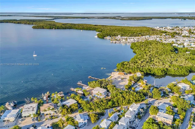 a terrace with outdoor seating and city view