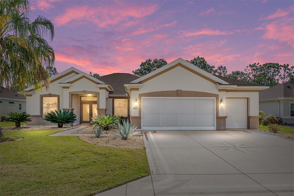 12511 Southeast 91st Terrace Road Summerfield, FL 34491 - Photo 1 of 1 Twilight Front of Home