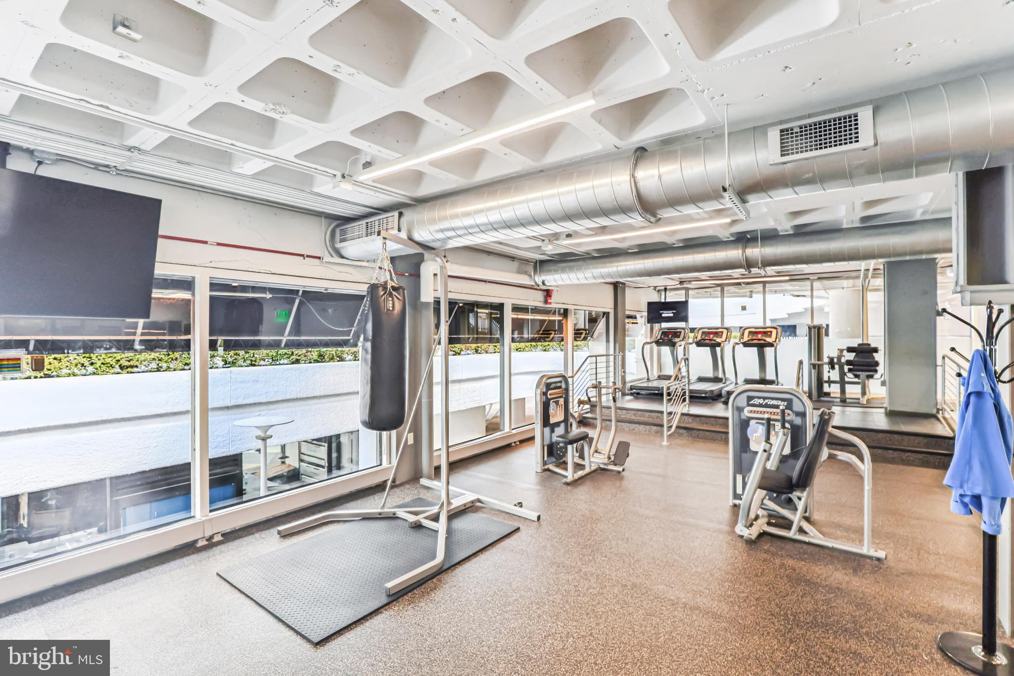 2500 Virginia Avenue Northwest, Unit 210S Washington, DC 20037 - Photo 17 of 25 a view of a room with gym equipment