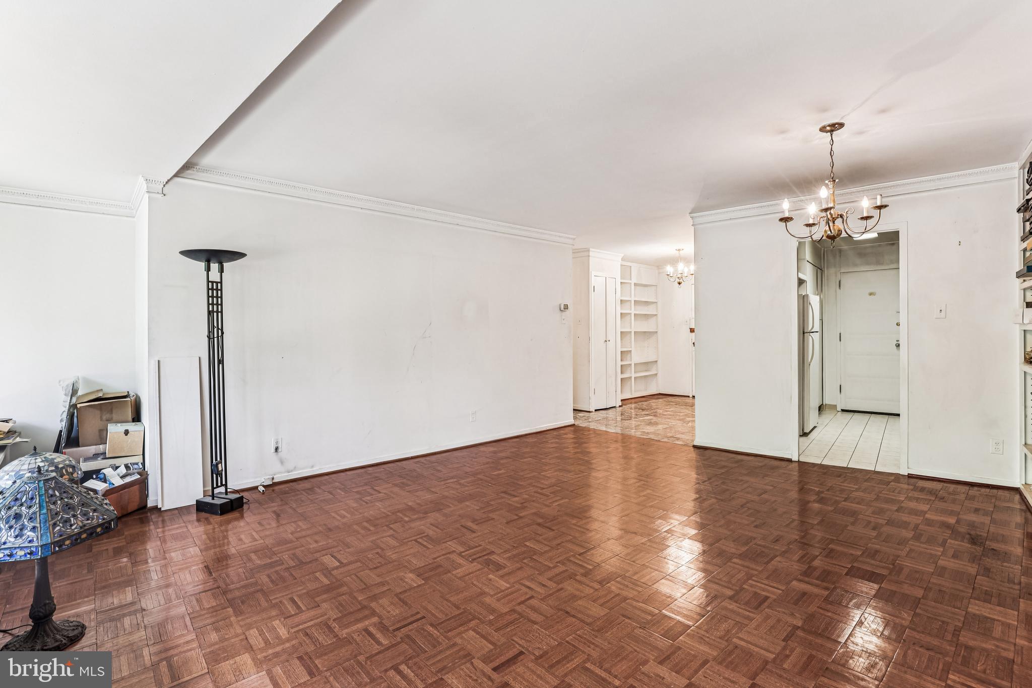 2500 Virginia Avenue Northwest, Unit 210S Washington, DC 20037 - Photo 6 of 25 a view of an empty room with wooden floor