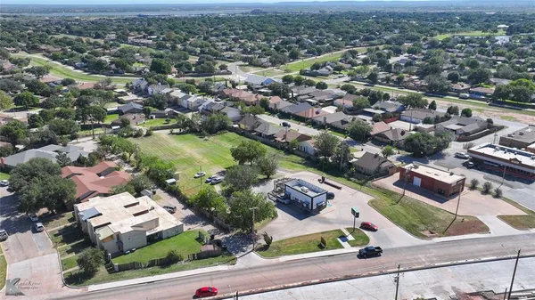 an aerial view of a city with lots of residential buildings