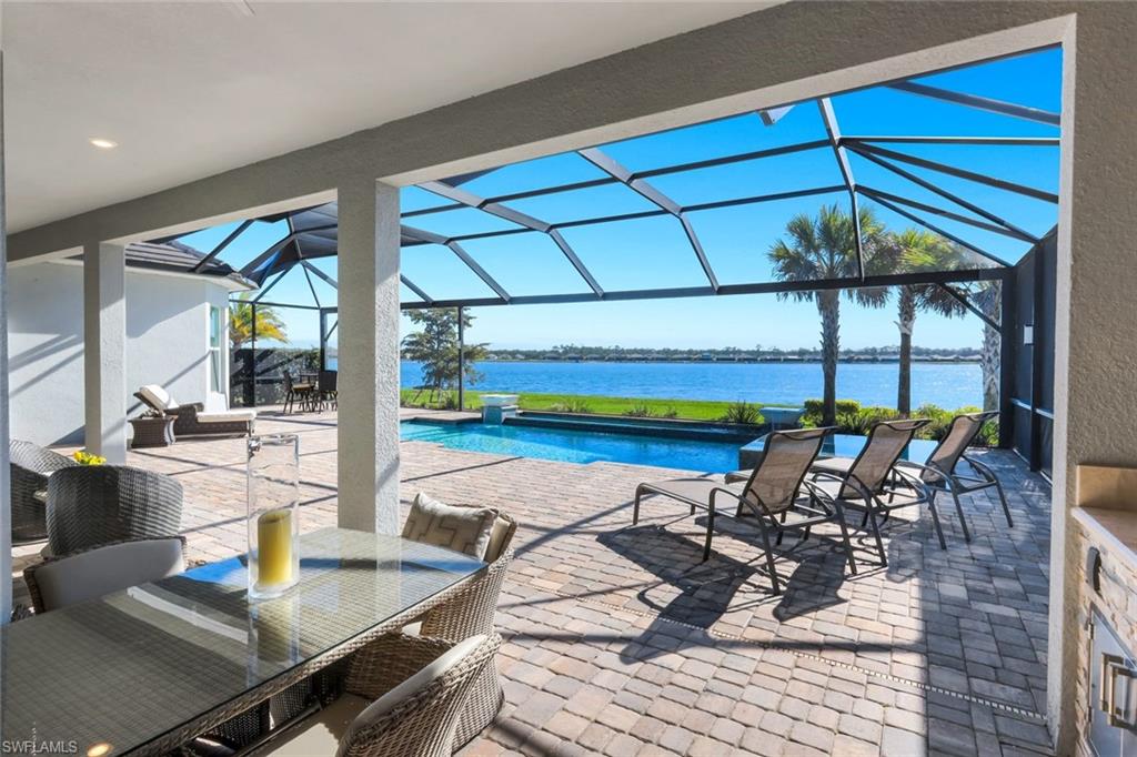 14630 Blue Bay Circle Fort Myers, FL 33913 - Photo 14 of 43 a dinning table and chairs in the patio