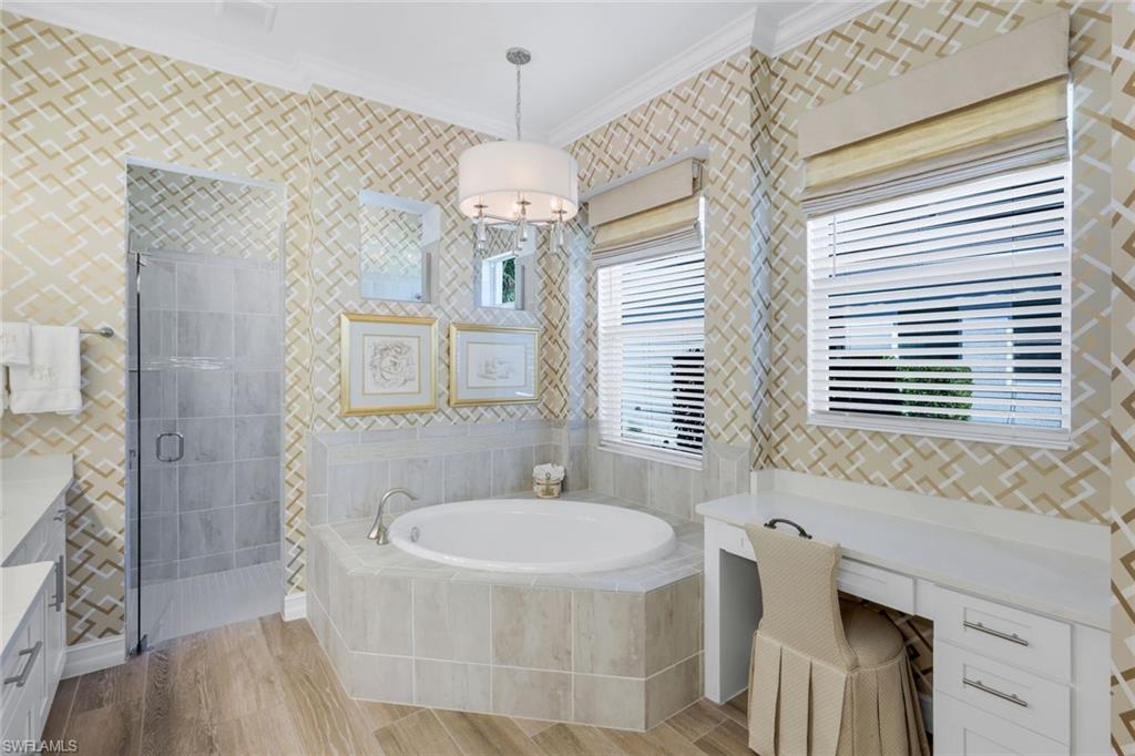 14630 Blue Bay Circle Fort Myers, FL 33913 - Photo 17 of 43 a bathroom with a sink and a mirror