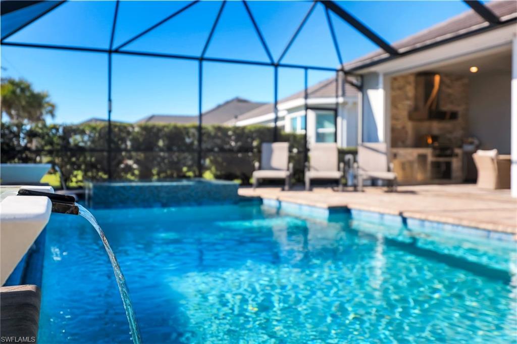 14630 Blue Bay Circle Fort Myers, FL 33913 - Photo 22 of 43 a view of a two chairs and table in the patio
