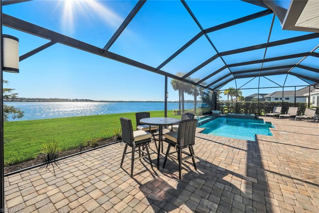 14630 Blue Bay Circle Fort Myers, FL 33913 - Photo 23 of 43 a patio with view of a backyard