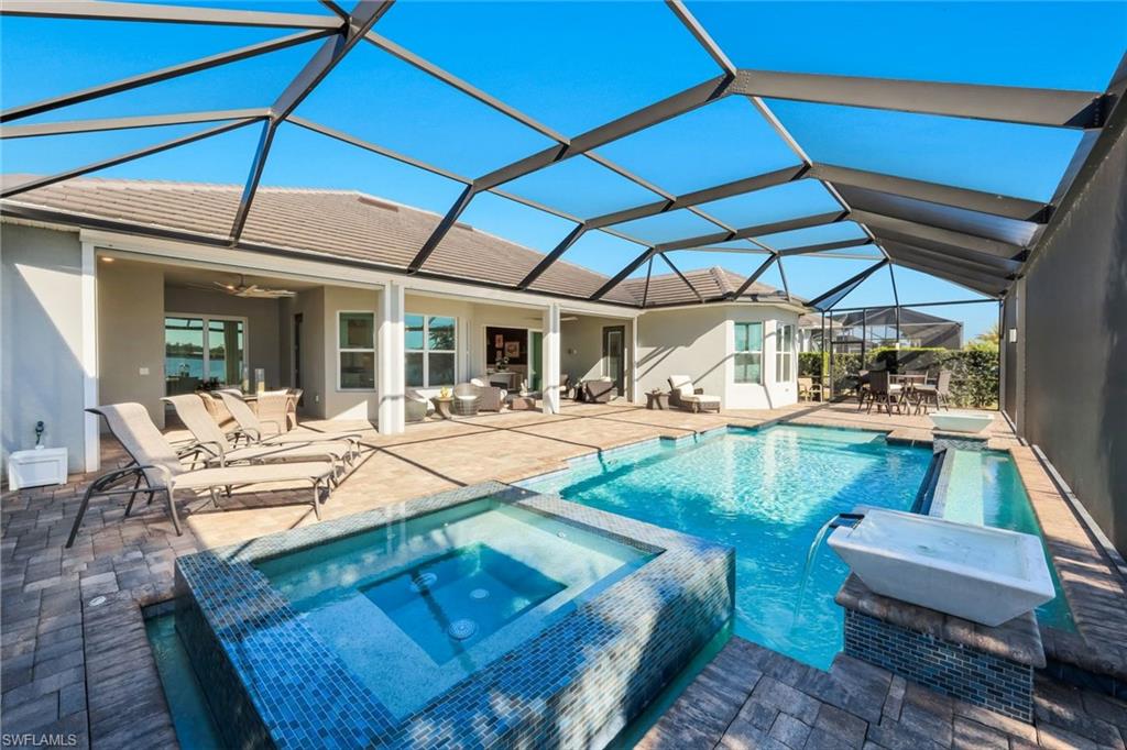 14630 Blue Bay Circle Fort Myers, FL 33913 - Photo 26 of 43 a view of outdoor space yard deck patio and swimming pool