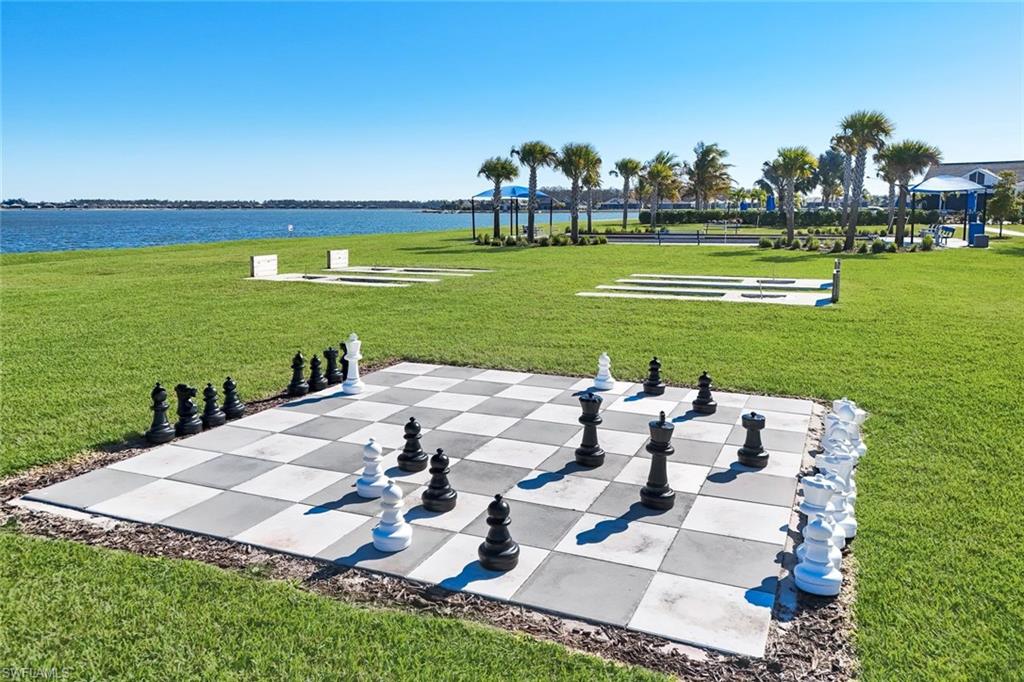 14630 Blue Bay Circle Fort Myers, FL 33913 - Photo 36 of 43 a view of a house with a big yard