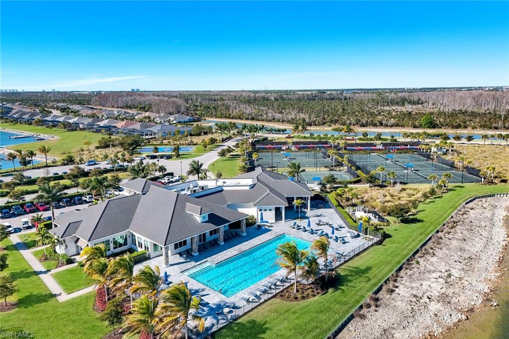 14630 Blue Bay Circle Fort Myers, FL 33913 - Photo 40 of 43 an aerial view of residential houses with outdoor space and swimming pool