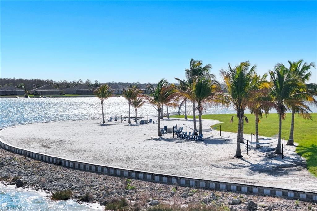 14630 Blue Bay Circle Fort Myers, FL 33913 - Photo 42 of 43 a view of a ocean with a palm tree