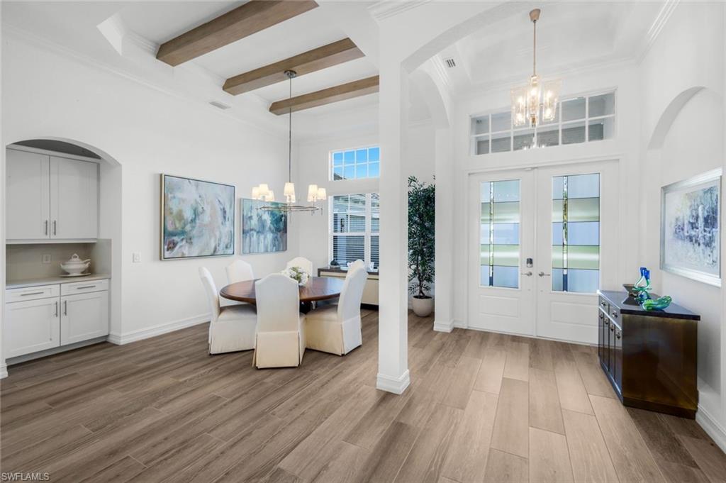 14630 Blue Bay Circle Fort Myers, FL 33913 - Photo 6 of 43 a living room with furniture and wooden floor