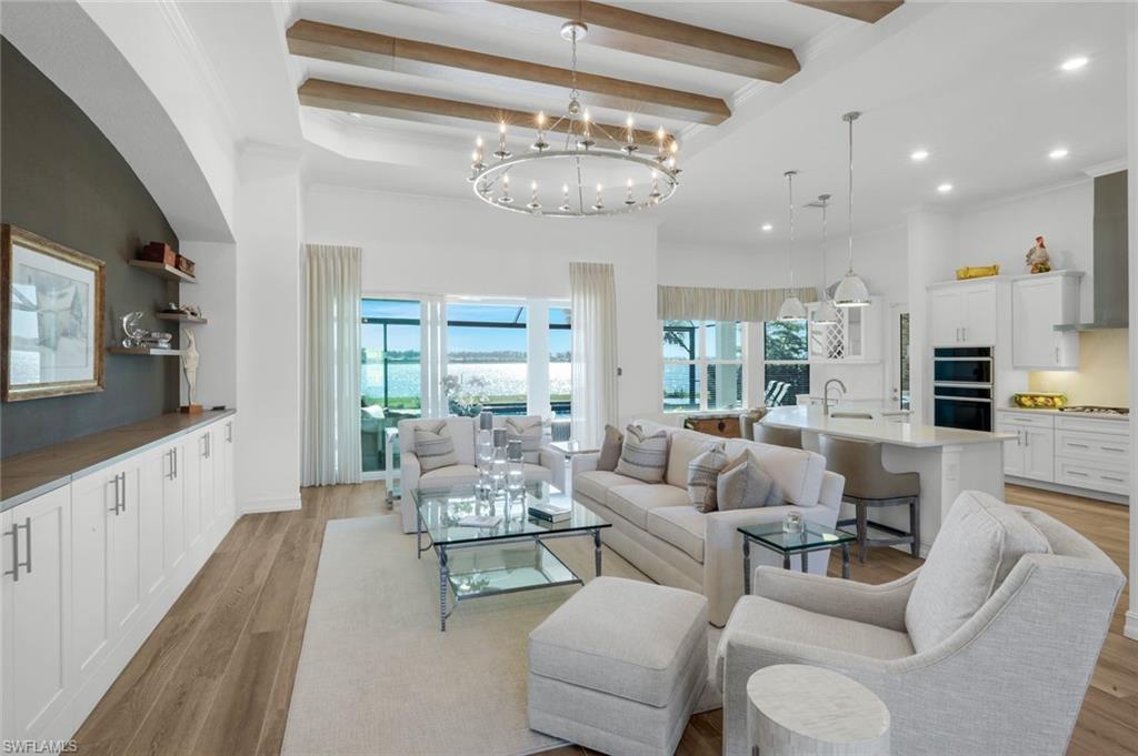 14630 Blue Bay Circle Fort Myers, FL 33913 - Photo 7 of 43 a living room with furniture and a large window