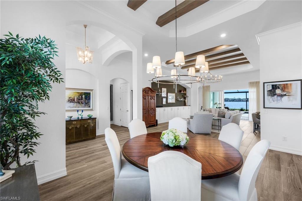 14630 Blue Bay Circle Fort Myers, FL 33913 - Photo 8 of 43 a living room with furniture and wooden floor