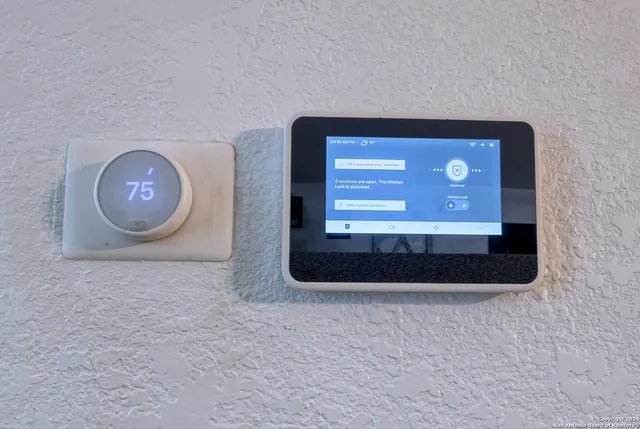 a view of a livingroom with a wooden floor and a large window