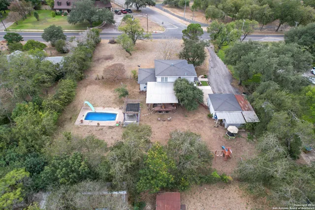 an aerial view of house with outdoor space