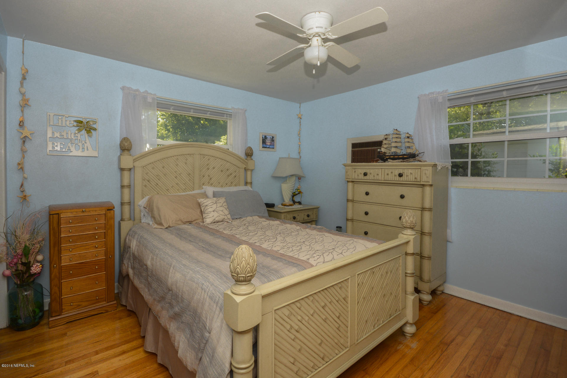 2104 Dean Road Jacksonville, FL 32216 - Photo 11 of 20 a bed room with a bed and a window